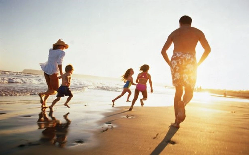 a representative image of a family in a beach