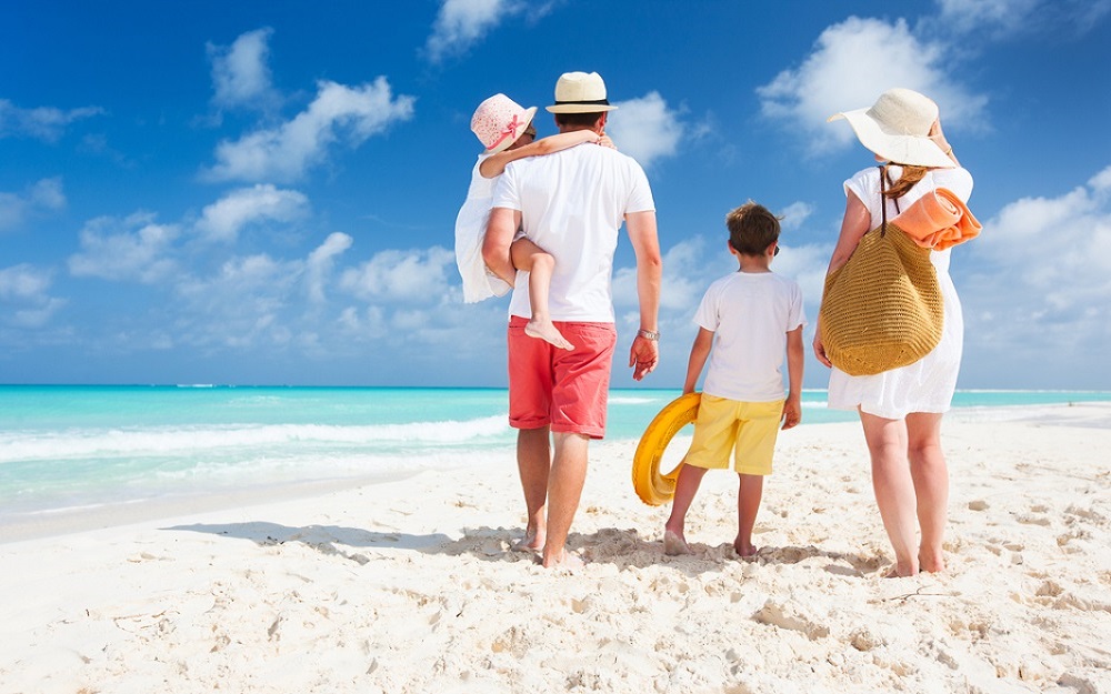 a representative image of a family in a beach